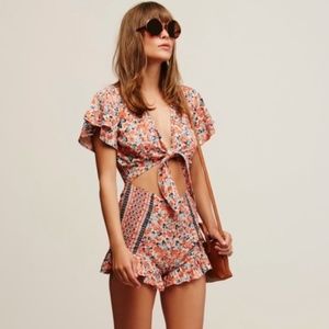 NWOT Free People Boho Surf Date Front Tie Copper Floral Cutout Romper.